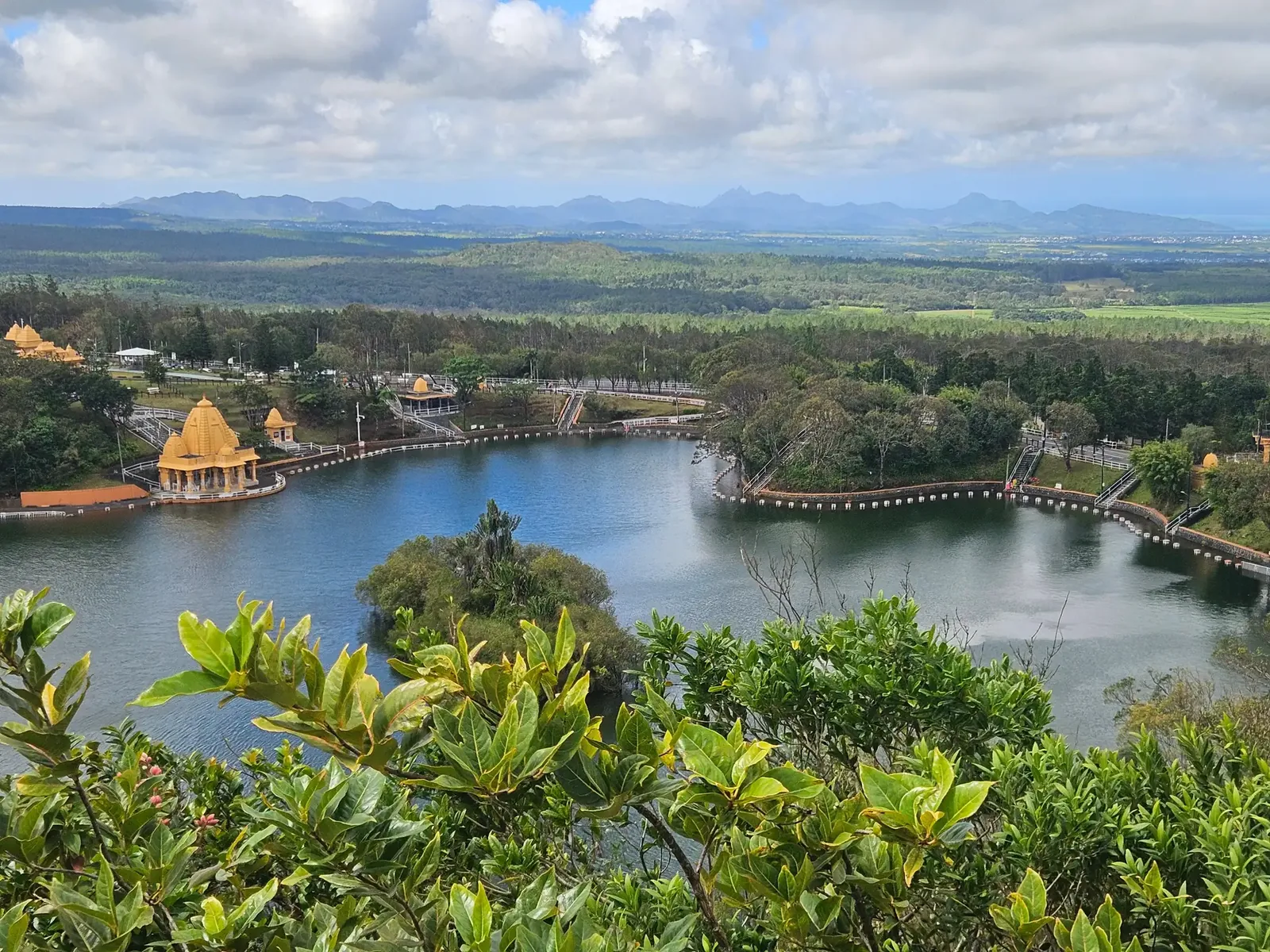 Grand Bassin, also known as Ganga Talao, with lakeside Hindu temples and surrounding greenery in Mauritius.