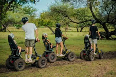 Visitors on Safari Eco Rider vehicles at Casela Nature Parks in Mauritius.